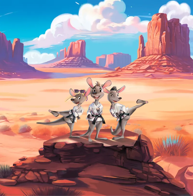George, Brianna and Jackson standing on a red rock in the desert